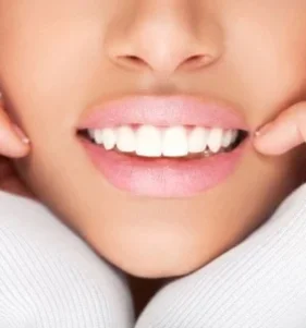 Несъемное протезирование: Восстановление зуба постоянной металлокерамической коронкой