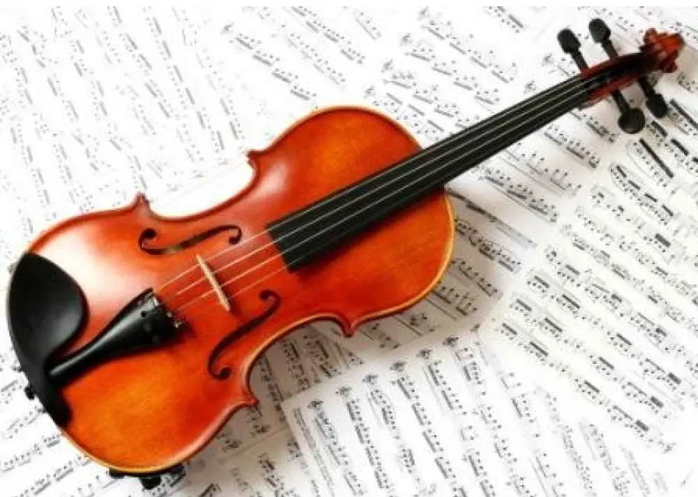 Обучение игре на скрипке.