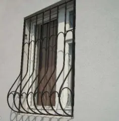 Дутые металлические решетки на окна